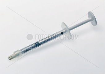 Collagen implant syringe.