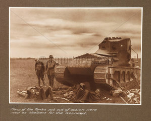 Tank and wounded soldiers  c 1917.