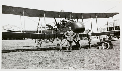 Pilot and biplane  c 1917.