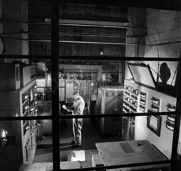 Man in furnace control room at Morgan Crucible  Battersea  1964.