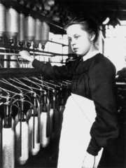 Young girl working in a cotton mill  Lancashire  c 1880.