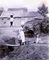 'Woman and girl by stream'  UK  c 1885. Sil