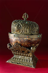 Bowl made from a human skull and lined with bronze  Tibetan  19th century.