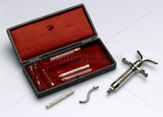 Dental anaesthetic syringe  cased  with accessories  1907-1920.
