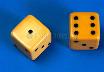 A pair of dice made in imitation ivory celluloid  early 20th century.