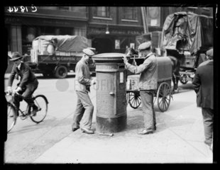 Refurbishing a pillar box  1933.