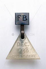 Triangular polythene medallion  1938.