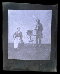 Men with camera  19th century.
