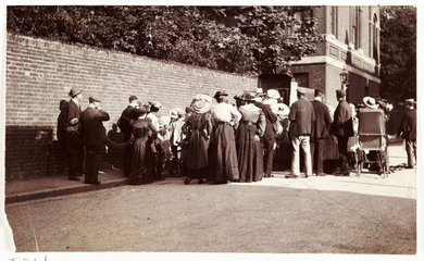 Crowd in a street  c 1905.
