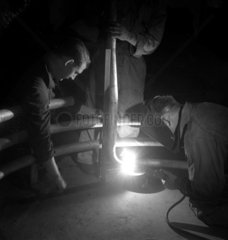 Three men welding a hirca tube  Talbot Stead Tubes  Walsall  1948.