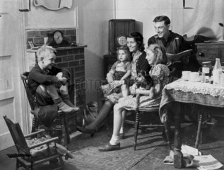 Family in their new prefabricated house  24 October 1944.