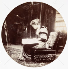 Woman reading  c 1890