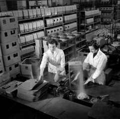 Women making cases for 16mm projectors  Mitcheldean  1956.