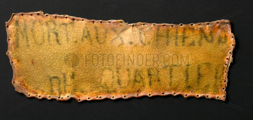 Human skin tattooed with inscription  probably French  1850-1920.