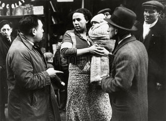 Scene on a picket line  Spitalfields rent strike  London  16 January 1939.
