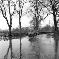 Floods on the road to the Severn and Avon Lock  Tewkesbury  1950.