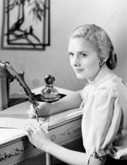 Woman writing  1949.