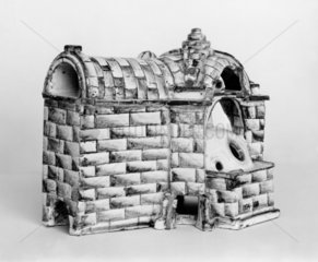 Glazed china model of a glass furnace  1750-1800.