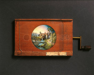 Combined lever and rotary magic lantern slide  19th century.