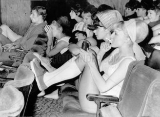 Girls watching the singer Tony Bennett perform  7 November 1965.