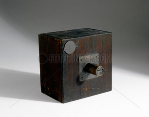 Camera with lens and metal focusing cover  c 1840.