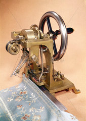 Early sewing machine by Elias Howe  c 1846.