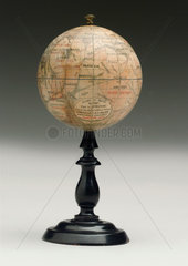 Mars globe on a black wooden stand  1892.