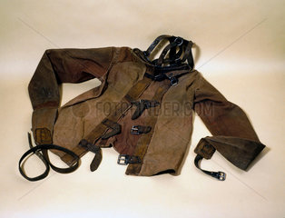 Canvas and leather strait jacket  c 1930.
