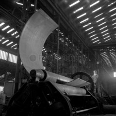 A machine bends a large steel plate at the works of Davy United  Derby  1960.