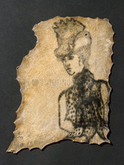 Human skin  tattooed with clothed female  probably French  1850-1920.