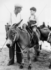 Donkey riding at Margate  Kent  3 August 1949.