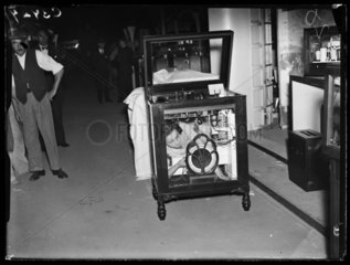 Woman inside a radiogram  Radiolympia  London  1933.