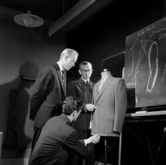 Training trailors at Montague Burton: fitting a suit  Guisborough  1960.