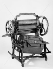 Model washing and wringing machine  c 1870.