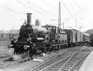 A class PO/1 4-4-0 locomotive leaving Rotterdam Station  Holland  1932.