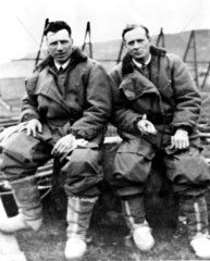 Alcock and Brown in flying suits  c 1919.
