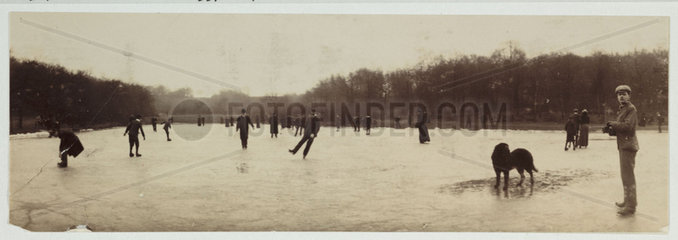 Ice skaters on a frozen lake  c 1900.
