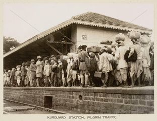Crowds at Kurduwadi Station  India  c 1930.