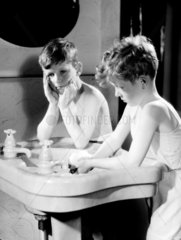 Boys washing at a basin  c 1948.