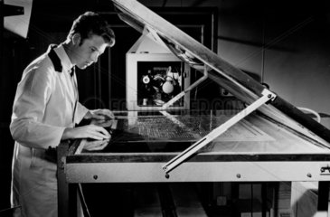 Printed circuit production: a photographer and flat table  1967.