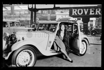 Woman in a sports car at the Olympia Motor Show  1932.