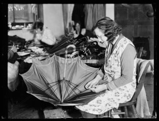 Woman making an umbrella  1932.