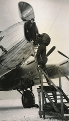 Loading baggage into an Avro Lancastrian airliner  c 1940s.