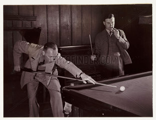 Playing snooker  c 1936.