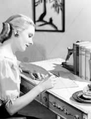 Woman writing  1949.