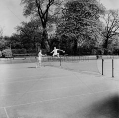 Leaping the tennis net  1955.