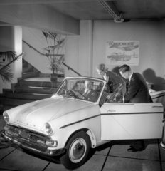 VIsitors inspect new Hillman Minx Convertible in the showroom 1961.
