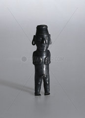 Silver male deity statue  Peruvian.