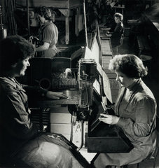 Female employees at Morganite load resistors on the press line at Jarrow.