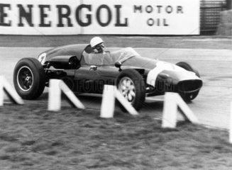 Stirling Moss driving a Cooper BRM  c 1950s.